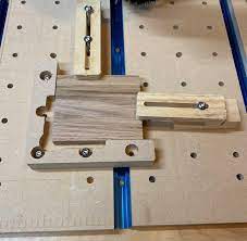 Here the fences (left & bottom) are used along with a toe clamp (top) and eccentric clamp (right)