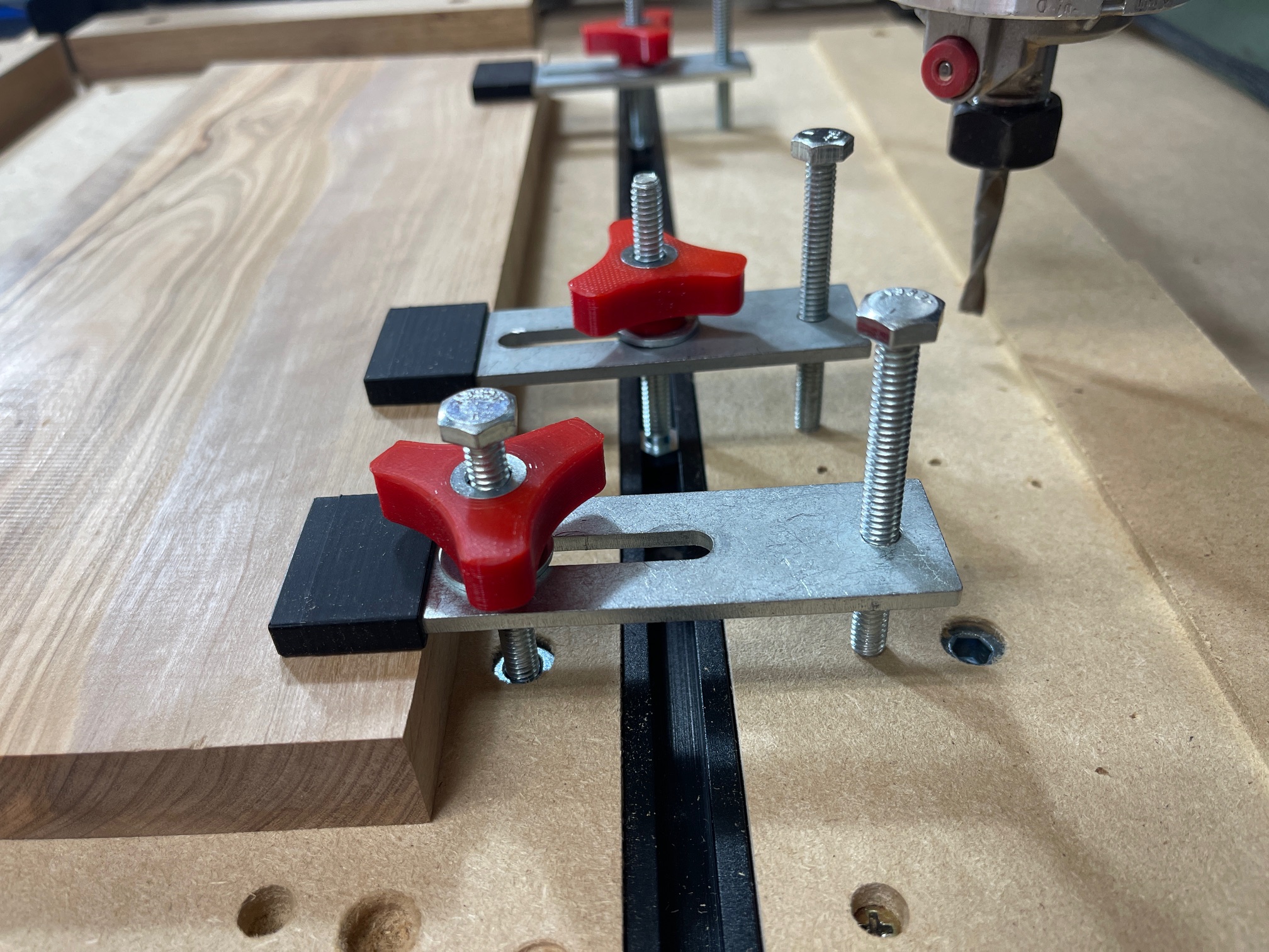 Don't be afraid to use a combination of t-tracks and threaded inserts, or mix and match your workholding