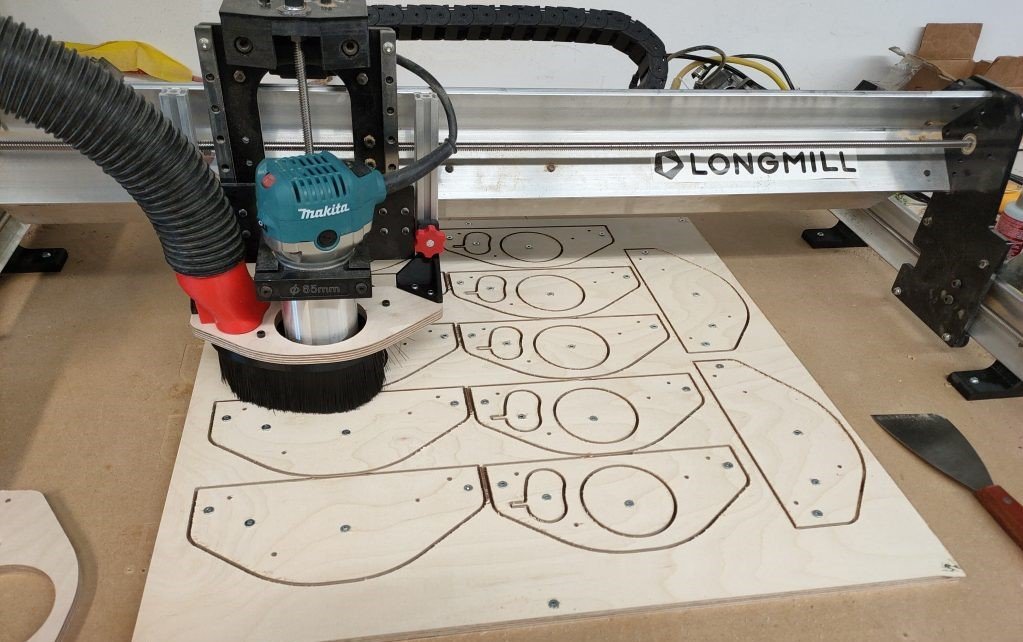 Here we have secured the material and the individual parts being cut out. No tabs being used here.